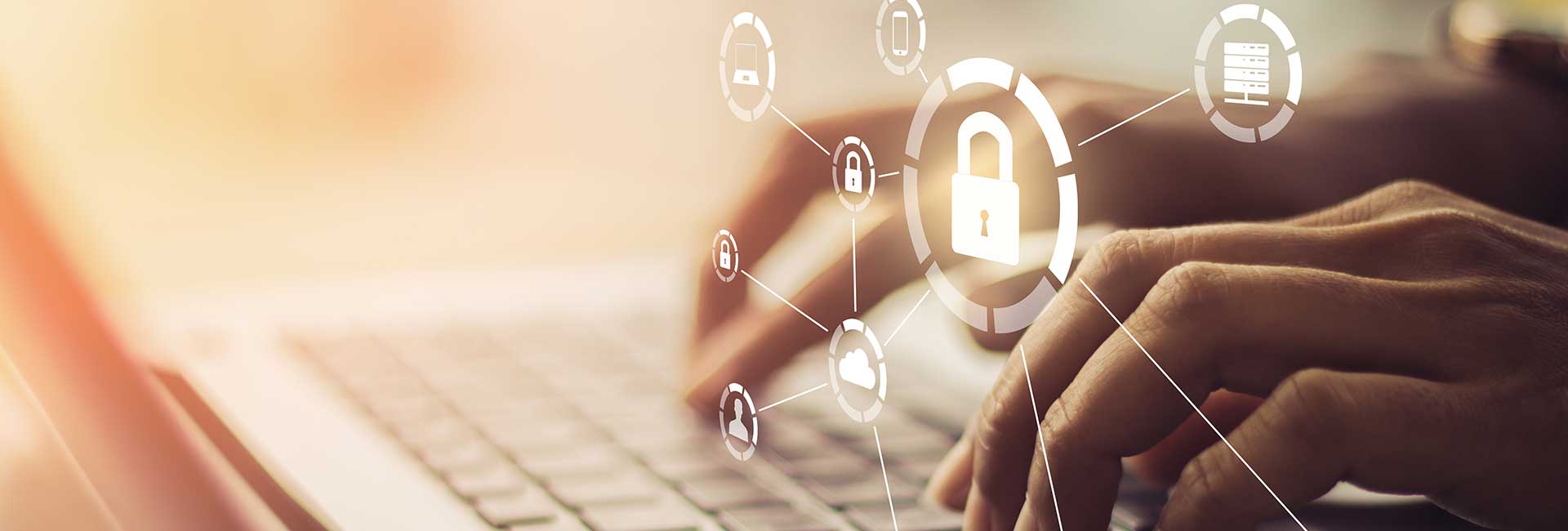 Hands typing on a laptop keyboard with digital security lock icons overlaid, representing cyber security and data protection.